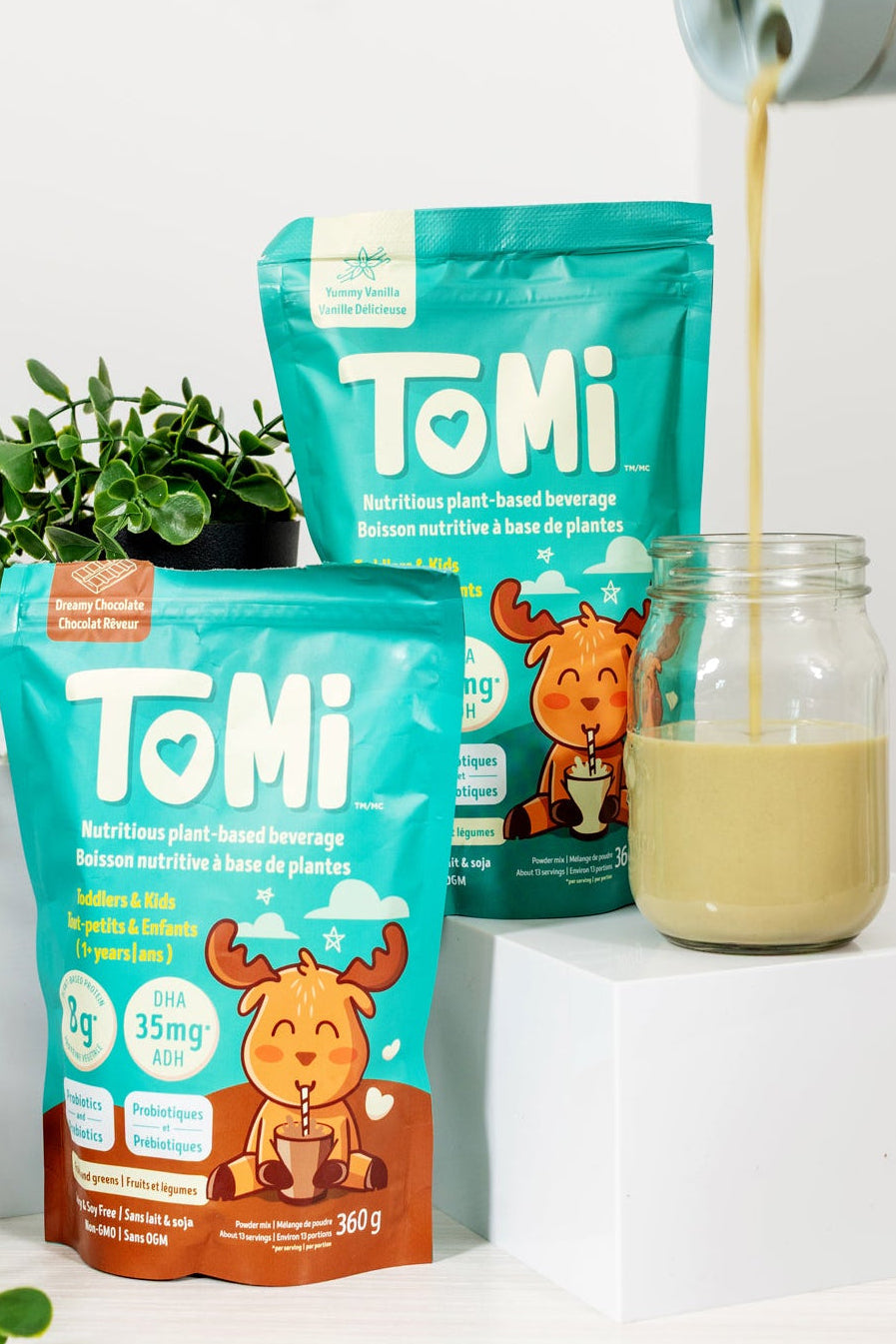 Tomi plant-based protein for kids being poured into a jar