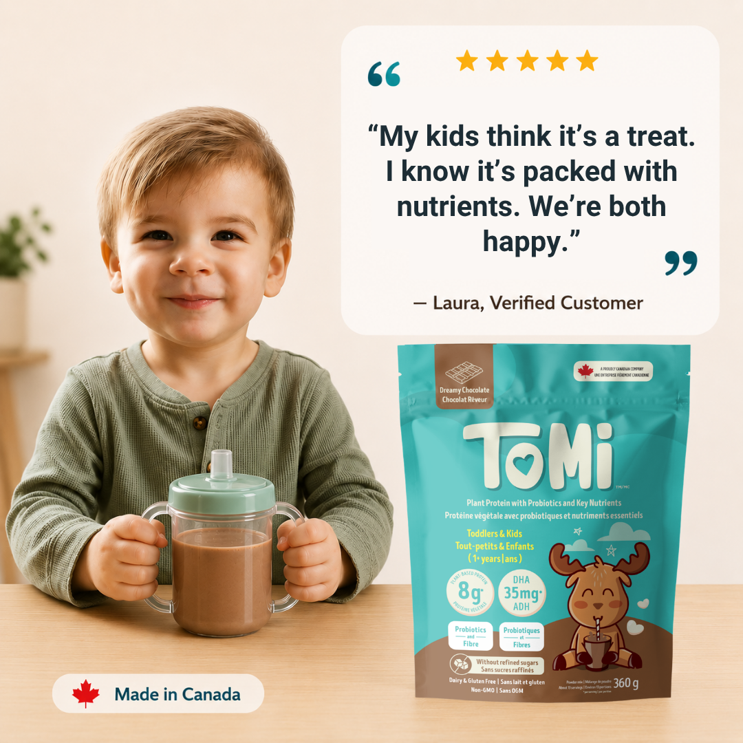 Child holding a mug with a TOMi product package and customer review on a light background
