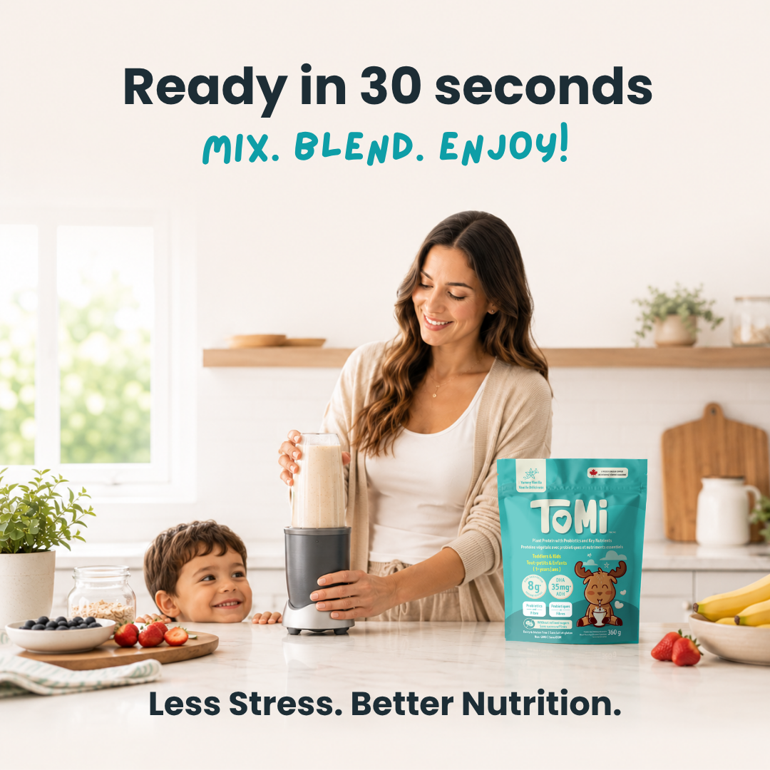 Woman and child in a kitchen with a blender and TOMi product, promoting quick and easy meal preparation.